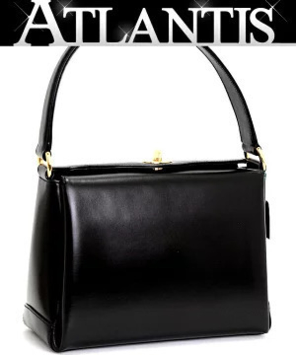 Gucci turn lock handbag leather black